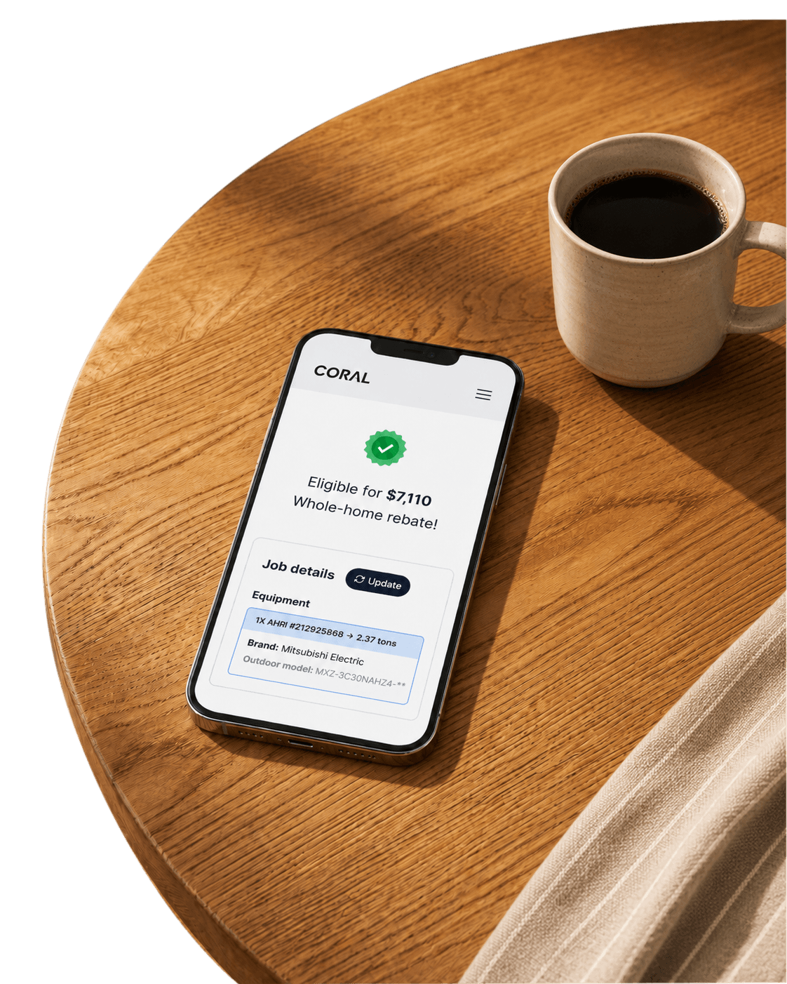 Coral rebate eligibility shown on a phone